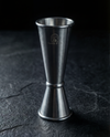 Double-sided stainless steel Jigger, included in The Full Bar.
